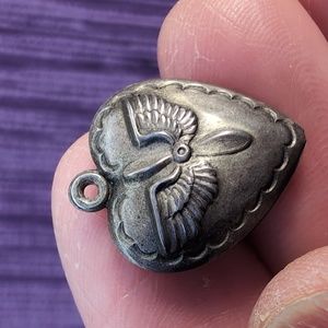 Antique sterling silver puffed heart charm
